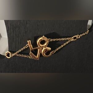 EUC LOUIS VUITTON LV&ME LOVE Bracelet Metal Gold. With dusty & box!